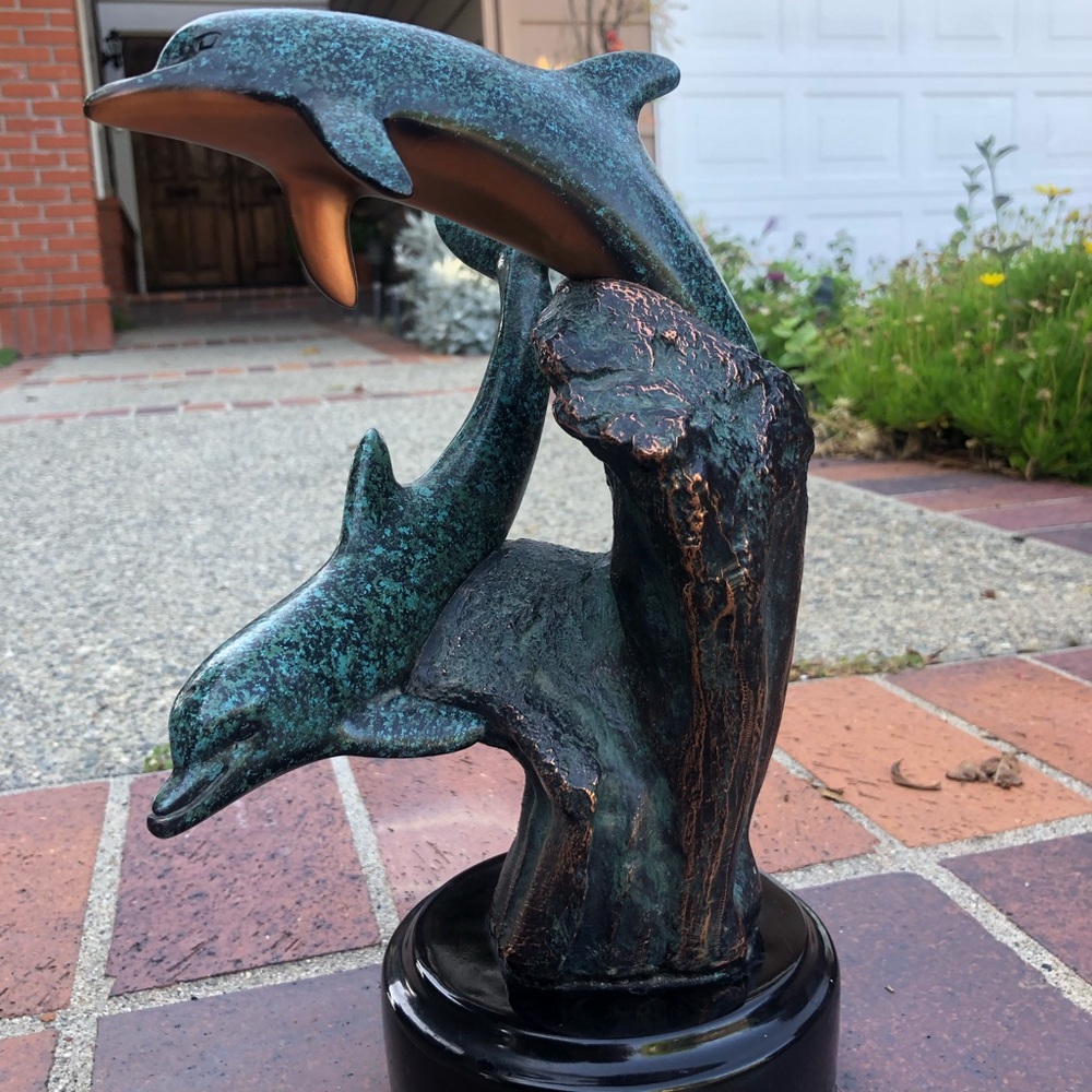 Dolphin Donjo sculpture waves and coral signed from yr 2000 stands 12 inches